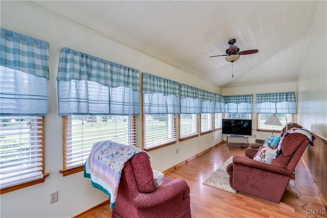 60 Van Buren St, Antwerp, NY 13608 - living area with wood finished floors, ceiling fan, and lofted ceiling