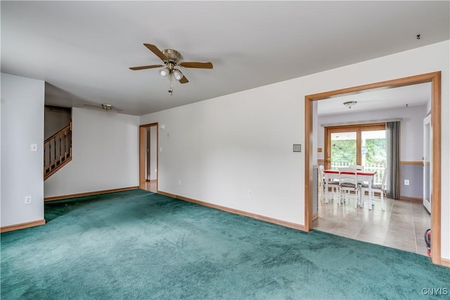60 Van Buren St, Antwerp, NY 13608 - empty room featuring ceiling fan, stairs, and carpet floors