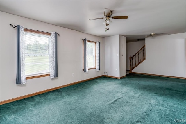 60 Van Buren St, Antwerp, NY 13608 - carpeted empty room featuring plenty of natural light, stairway, and a ceiling fan
