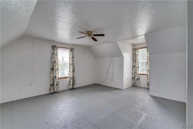 60 Van Buren St, Antwerp, NY 13608 - additional living space with lofted ceiling, ceiling fan, concrete floors, and a textured ceiling