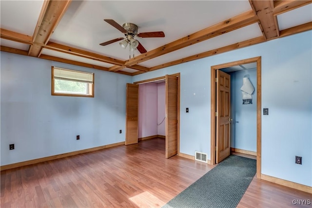 60 Van Buren St, Antwerp, NY 13608 - unfurnished bedroom with light wood-style floors, beam ceiling, and coffered ceiling