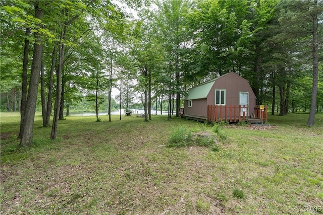 60 Van Buren St, Antwerp, NY 13608 - view of green lawn featuring an outdoor structure and a water view