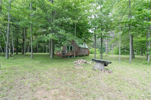 60 Van Buren St, Antwerp, NY 13608 - view of green lawn featuring a wooden deck and a forest view