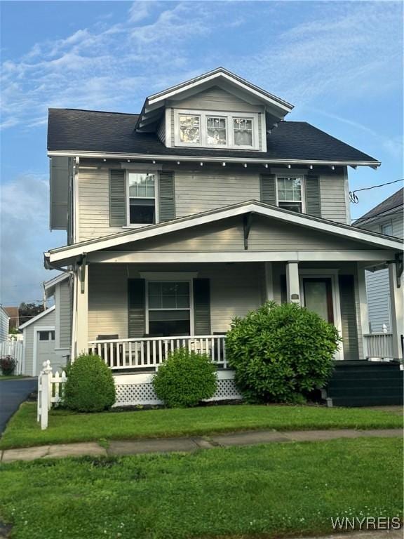115 N 17th St, Olean-City, NY 14760 - american foursquare style home with a porch and a front yard
