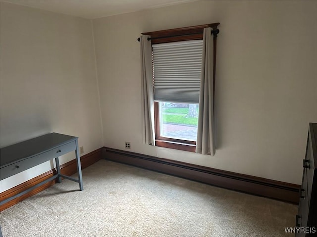 115 N 17th St, Olean-City, NY 14760 - spare room featuring light carpet and a baseboard radiator