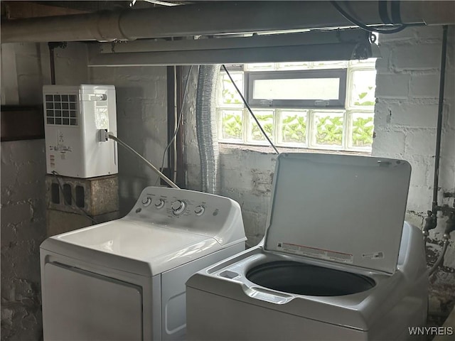 115 N 17th St, Olean-City, NY 14760 - laundry room featuring washing machine and clothes dryer and concrete block wall