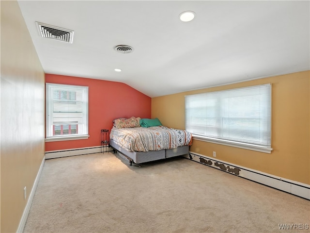 71 Saratoga Rd, Amherst, NY 14226 - bedroom featuring a baseboard heating unit, vaulted ceiling, carpet floors, and recessed lighting