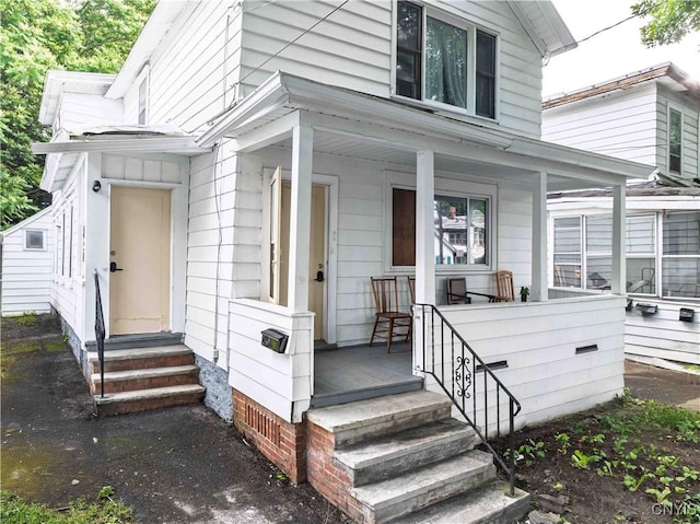 209 Lakeview Ave, Syracuse, NY 13204 - view of exterior entry featuring a porch