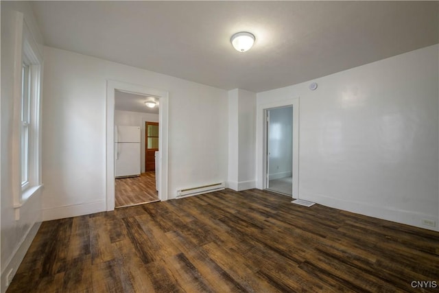 209 Lakeview Ave, Syracuse, NY 13204 - spare room with baseboard heating and dark wood-style flooring