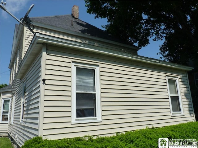 174 Bowen St, Jamestown, NY 14701 - view of home's exterior with a chimney
