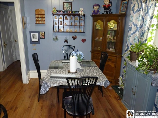 174 Bowen St, Jamestown, NY 14701 - dining space with wood finished floors and baseboards
