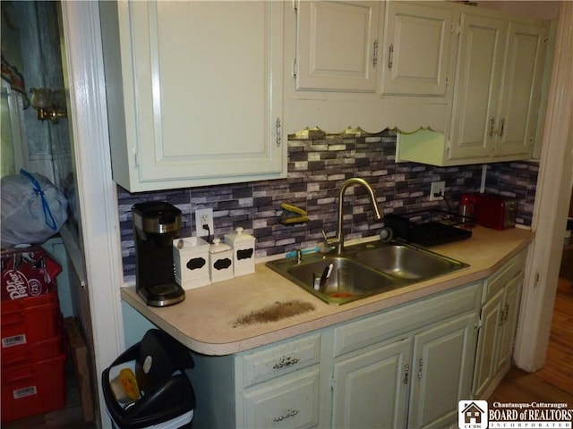 174 Bowen St, Jamestown, NY 14701 - kitchen with light countertops and backsplash