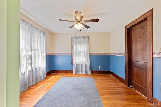 217 Mackay Ave, Camillus, NY 13219 - unfurnished room with ceiling fan and wood finished floors