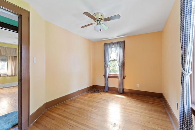 217 Mackay Ave, Camillus, NY 13219 - unfurnished room featuring plenty of natural light, light wood finished floors, and a ceiling fan