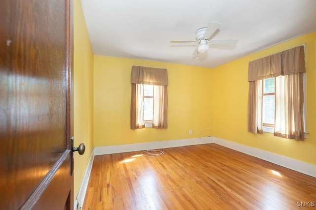 217 Mackay Ave, Camillus, NY 13219 - spare room with wood finished floors and a ceiling fan