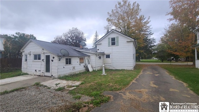 4010 Main St, Scio, NY 14880 - view of front of home featuring a metal roof