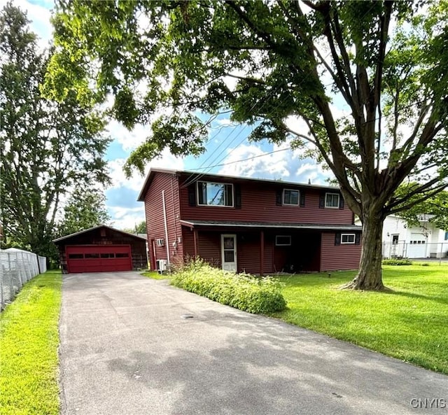 6473 Wembridge Dr, Dewitt, NY 13057 - view of front of home with a detached garage