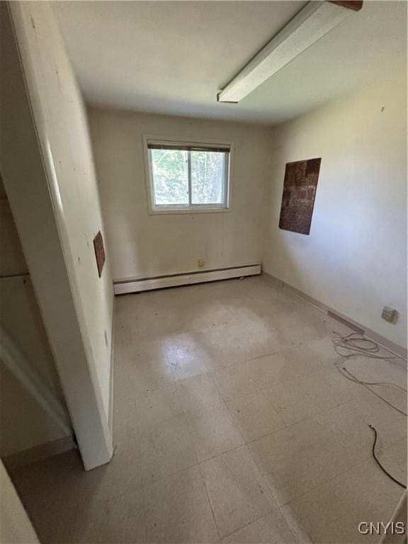 6473 Wembridge Dr, Dewitt, NY 13057 - unfurnished room with a baseboard heating unit