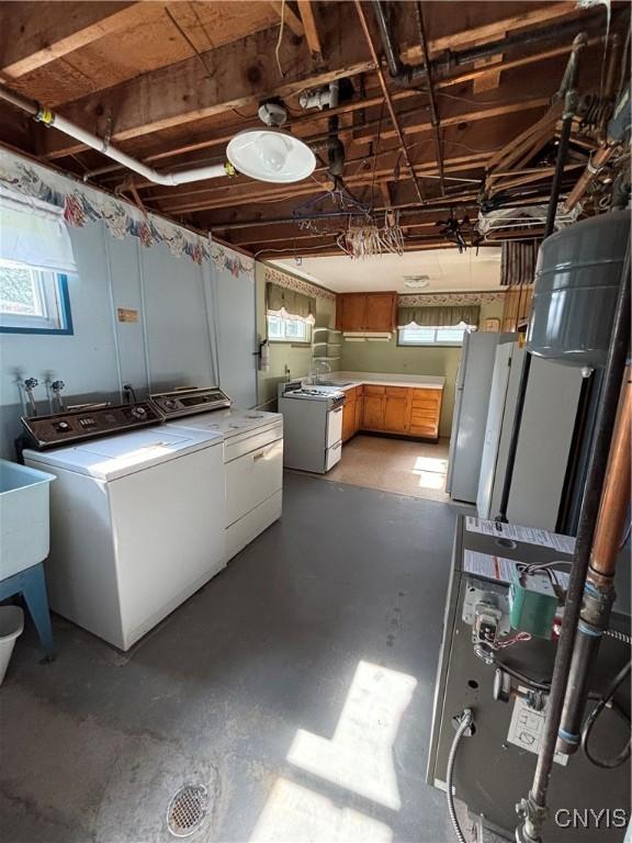 6473 Wembridge Dr, Dewitt, NY 13057 - basement featuring washer and dryer and freestanding refrigerator
