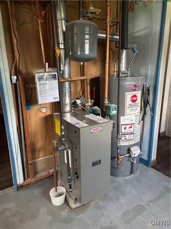 6473 Wembridge Dr, Dewitt, NY 13057 - utility room featuring gas water heater and a heating unit