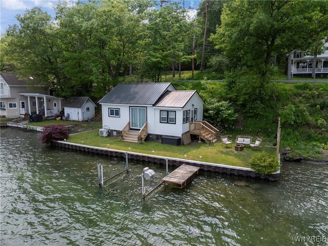15794 W Lake Rd, Pulteney, NY 14874 - dock featuring a water view, an outdoor fire pit, and entry steps