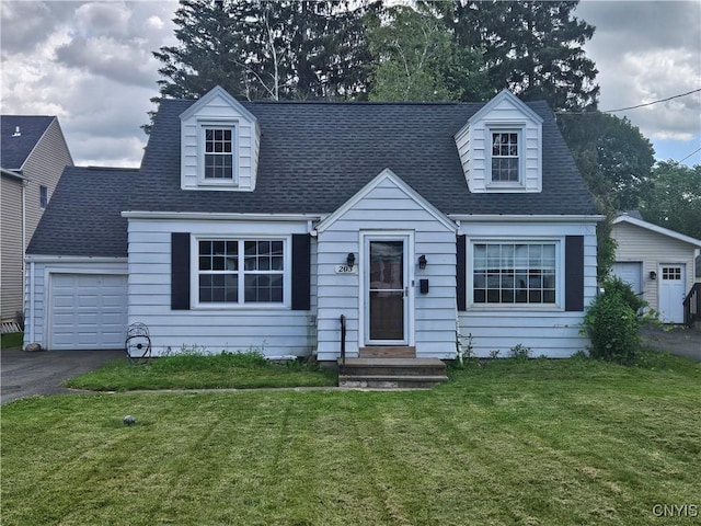 203 Windemere Rd, Geddes, NY 13219 - cape cod-style house with a garage, a front lawn, driveway, and roof with shingles