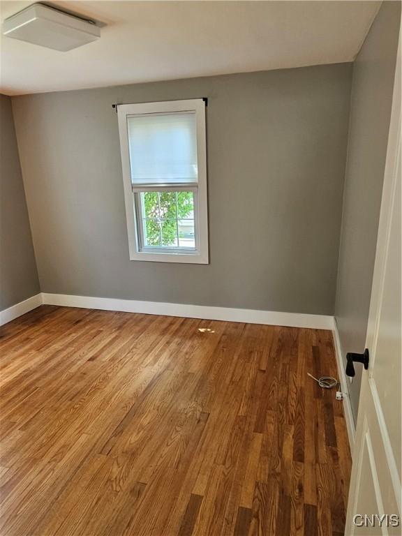 203 Windemere Rd, Geddes, NY 13219 - empty room featuring wood finished floors