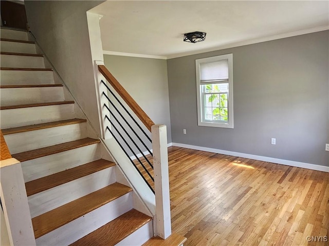 203 Windemere Rd, Geddes, NY 13219 - stairs with ornamental molding and wood finished floors