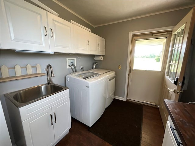 13810 Waterport Carlton Rd, Carlton, NY 14411 - laundry area featuring washing machine and clothes dryer, cabinet space, dark wood finished floors, and crown molding