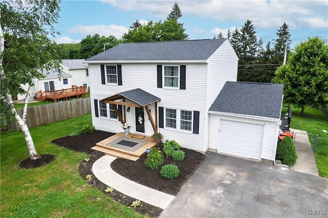 150 E Hawthorne Way, Sullivan, NY 13037 - traditional home with an attached garage, asphalt driveway, and roof with shingles