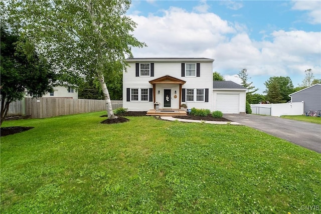 150 E Hawthorne Way, Sullivan, NY 13037 - colonial-style house featuring asphalt driveway and an attached garage