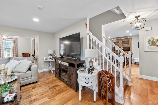 150 E Hawthorne Way, Sullivan, NY 13037 - living room featuring a chandelier, stairway, light wood-style flooring, and recessed lighting