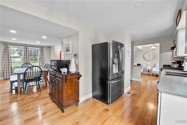 150 E Hawthorne Way, Sullivan, NY 13037 - kitchen with stainless steel fridge with ice dispenser, light wood-type flooring, and recessed lighting