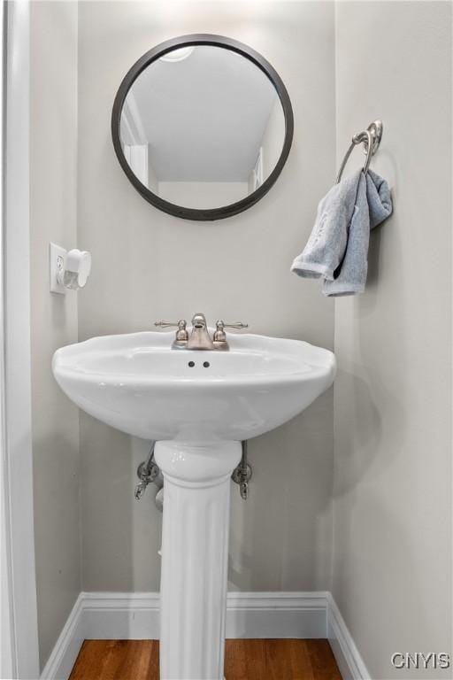 150 E Hawthorne Way, Sullivan, NY 13037 - bathroom with baseboards and wood finished floors
