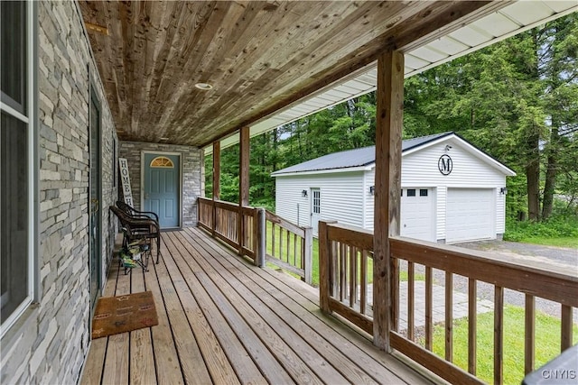 10327 Wolcott Hill Rd, Camden, NY 13316 - wooden deck featuring a garage and an outbuilding