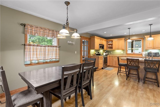 10327 Wolcott Hill Rd, Camden, NY 13316 - dining area with light wood-style floors, healthy amount of natural light, and recessed lighting