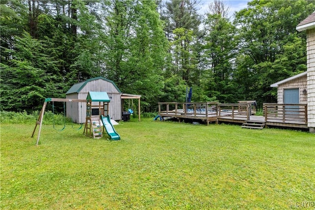 10327 Wolcott Hill Rd, Camden, NY 13316 - view of grassy yard with a playground and a deck