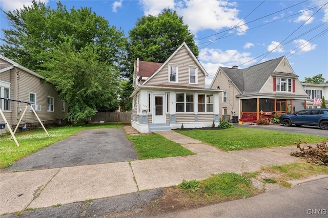 364 S 6th St, Fulton, NY 13069 - bungalow featuring a sunroom and driveway