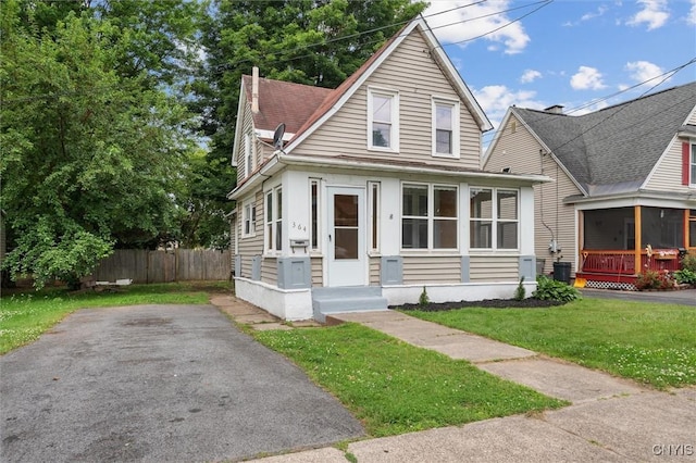 364 S 6th St, Fulton, NY 13069 - bungalow-style house with a chimney and roof with shingles