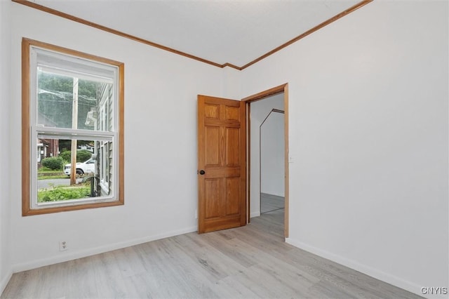 364 S 6th St, Fulton, NY 13069 - empty room featuring wood finished floors and crown molding