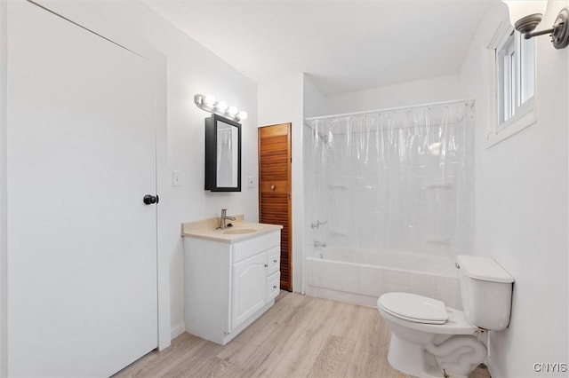 364 S 6th St, Fulton, NY 13069 - full bath with wood finished floors, vanity, and shower / bath combo with shower curtain