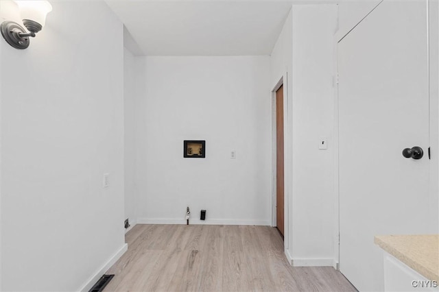 364 S 6th St, Fulton, NY 13069 - washroom featuring light wood finished floors and hookup for a washing machine