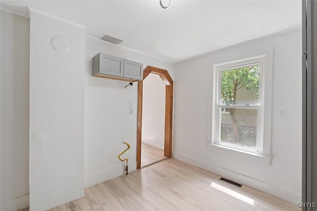 364 S 6th St, Fulton, NY 13069 - unfurnished room with light wood finished floors and crown molding