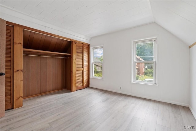 364 S 6th St, Fulton, NY 13069 - unfurnished bedroom with a closet, wood finished floors, and lofted ceiling