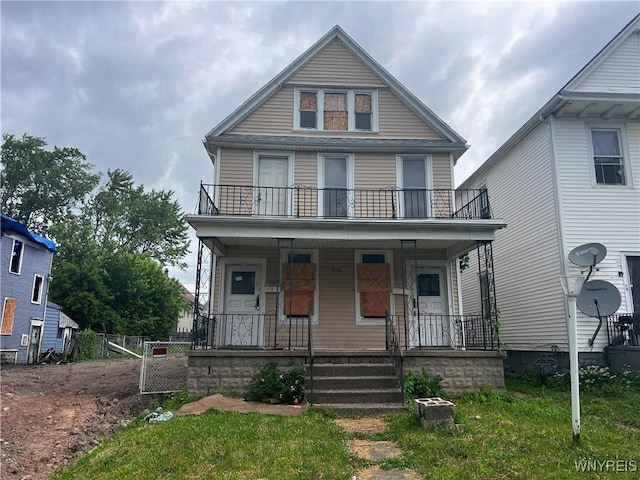 506 Glenwood Ave, Buffalo, NY 14208 - american foursquare style home featuring a balcony and covered porch