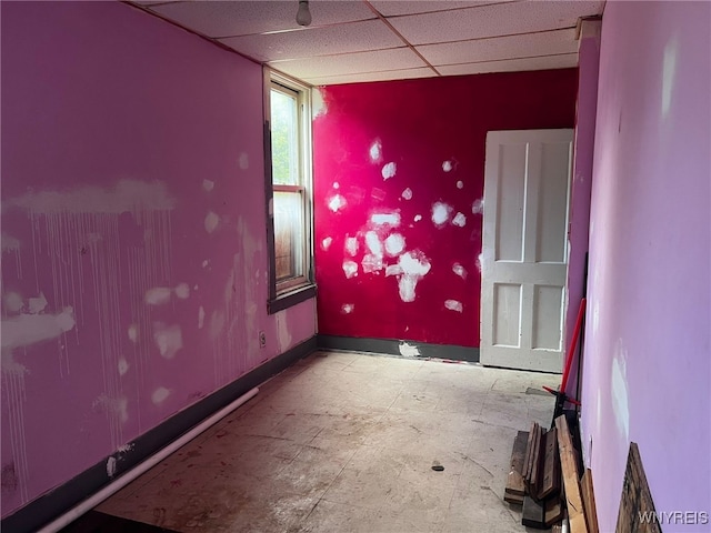 506 Glenwood Ave, Buffalo, NY 14208 - empty room featuring baseboards and a paneled ceiling