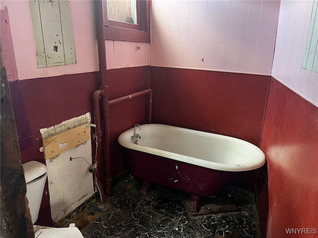 506 Glenwood Ave, Buffalo, NY 14208 - bathroom featuring a soaking tub and toilet