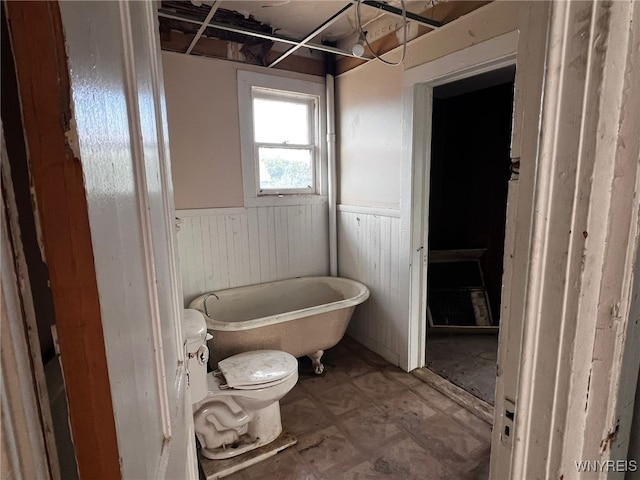 506 Glenwood Ave, Buffalo, NY 14208 - bathroom featuring a wainscoted wall and a soaking tub
