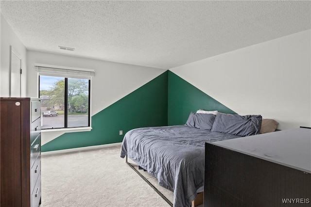 75B Foxberry Dr, Amherst, NY 14068 - bedroom featuring carpet floors and a textured ceiling