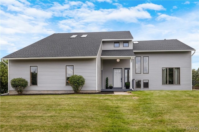 4925 Bentbrook Dr, Manlius, NY 13104 - rear view of property featuring a lawn and a shingled roof